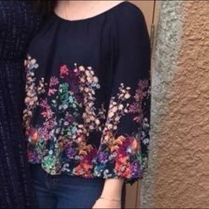 flowy blue floral blouse